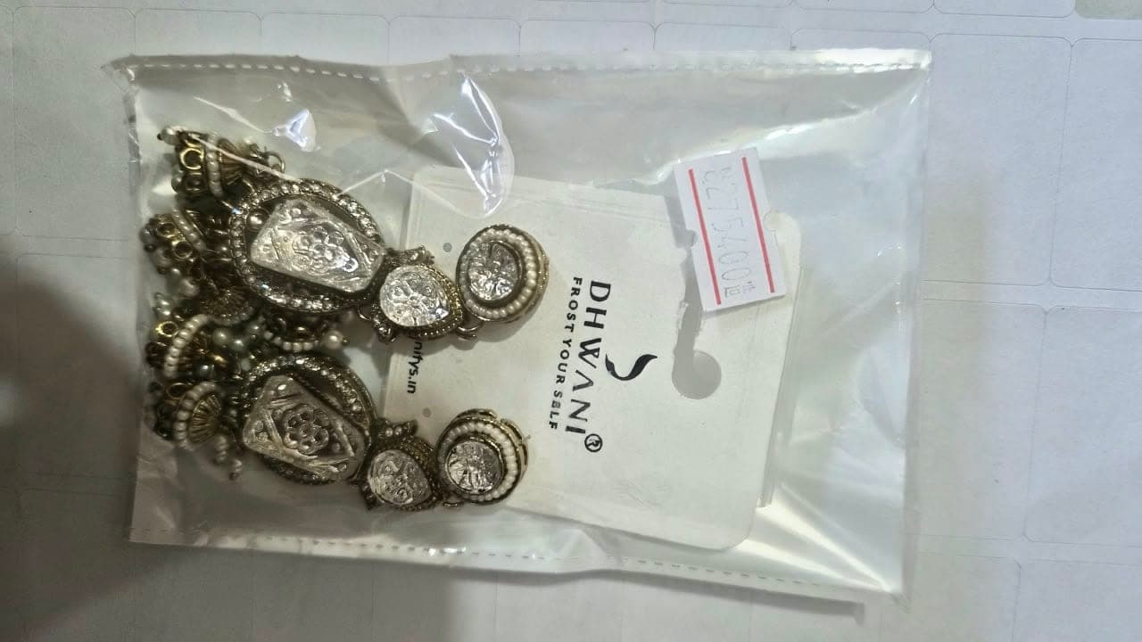 Regal Antique Silver-Tone Jhumka Earrings with Intricate Floral Detailing & Elegant Pearl Drops - Jewellery at House of Radhya Kharar