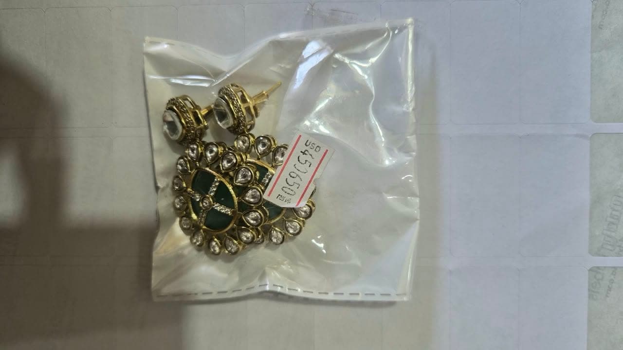 Regal Emerald Green Statement Earrings with Dazzling Moissanite Stonework & Elegant Gold-Tone Detailing - Jewellery at House of Radhya Kharar